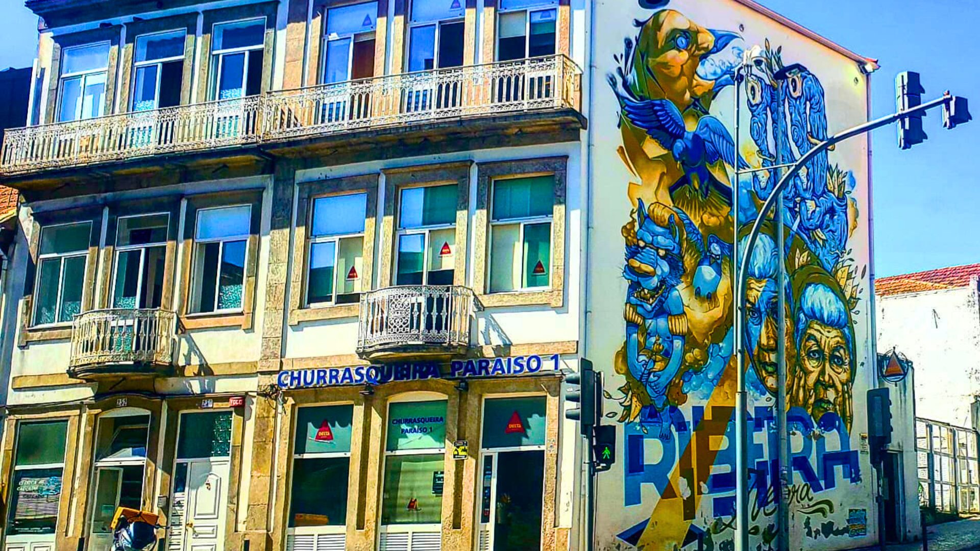 Street art mural on a building in Porto