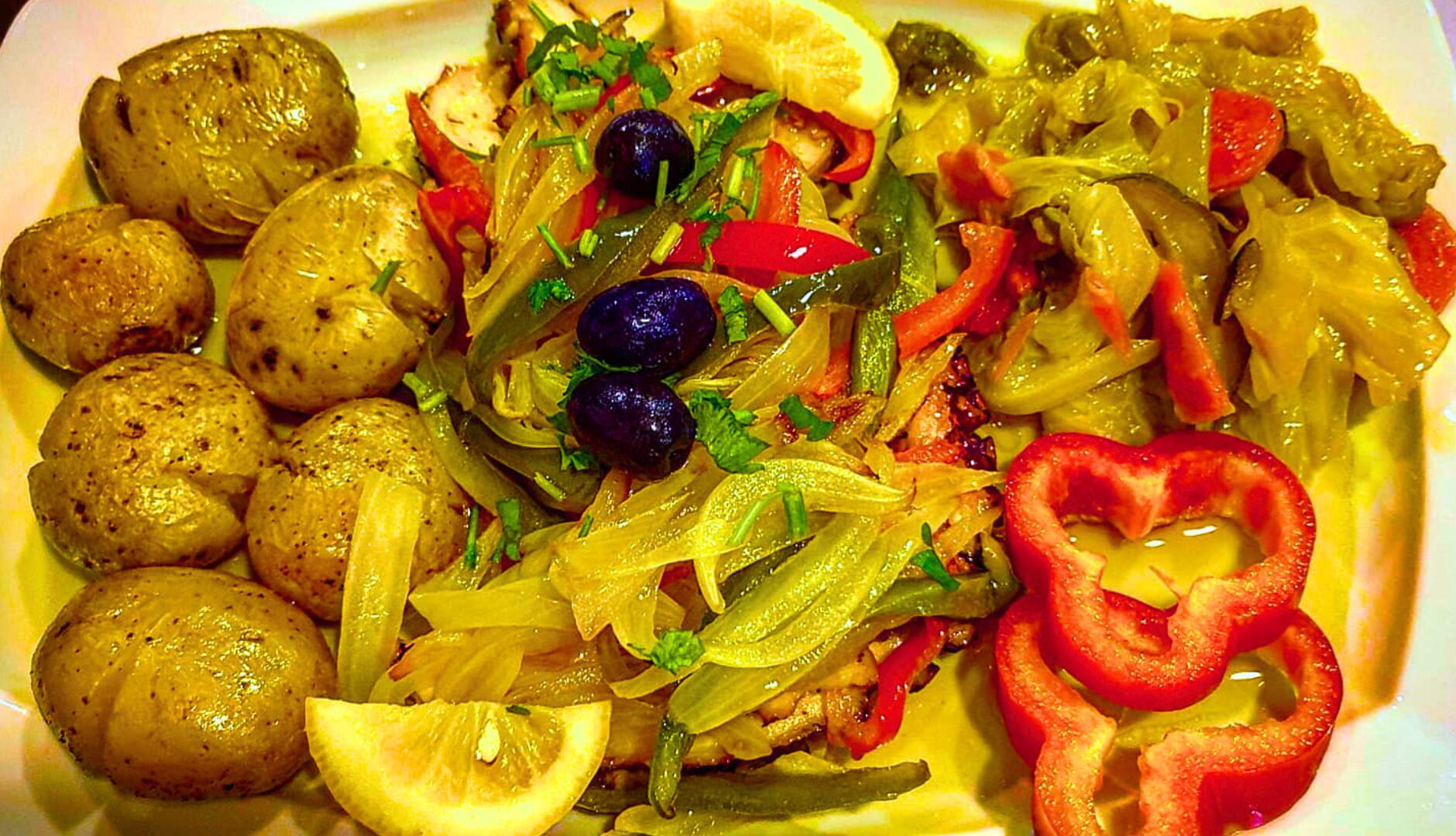 Portuguese octopus with potatoes and roasted peppers served in Porto