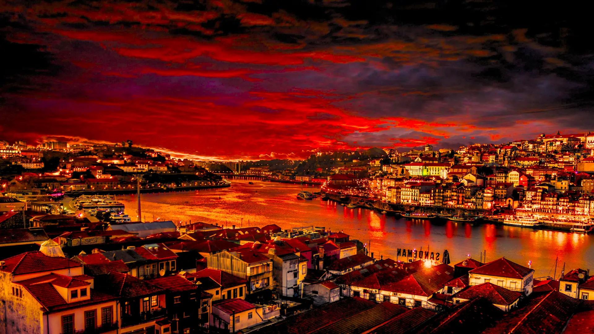 Night view of the Douro River towards the west in Porto