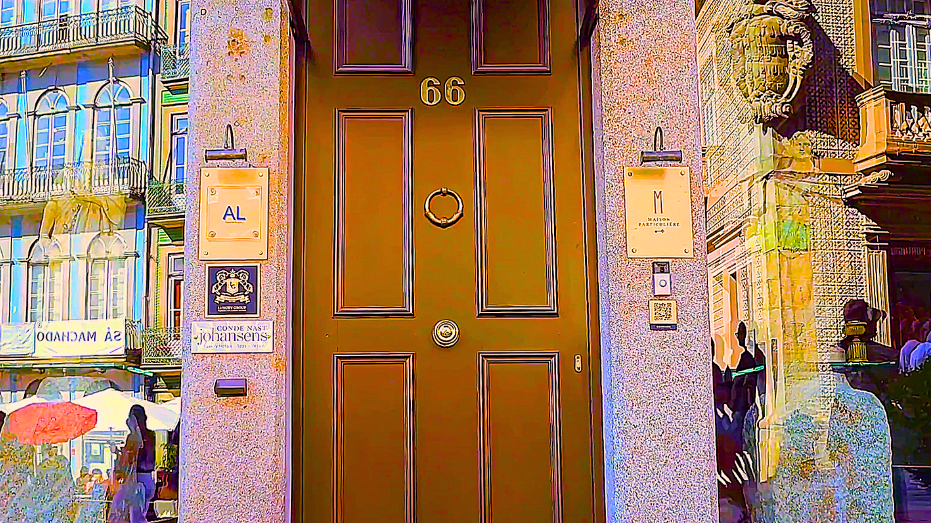 Old brown door on Rua das Flores in Porto