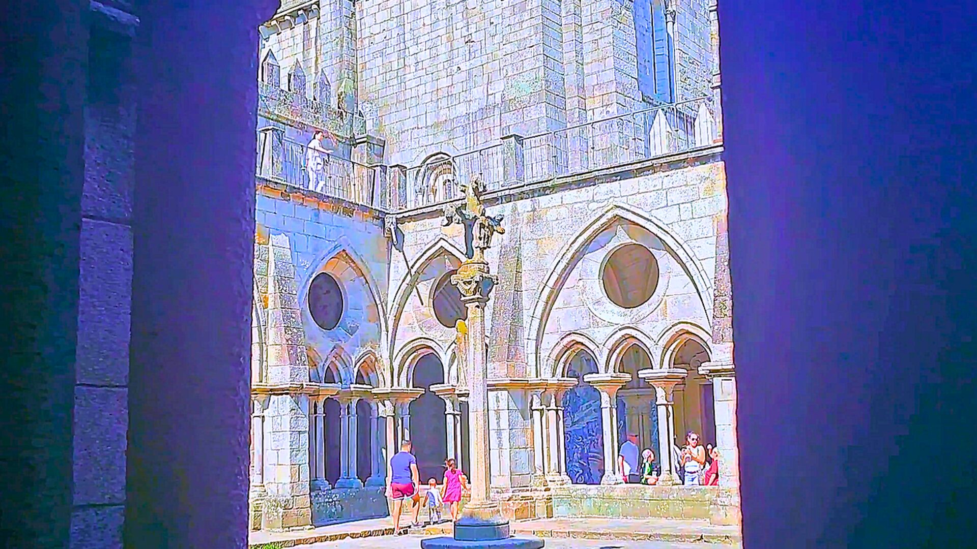 Cloister arches and central cross at Porto Cathedral