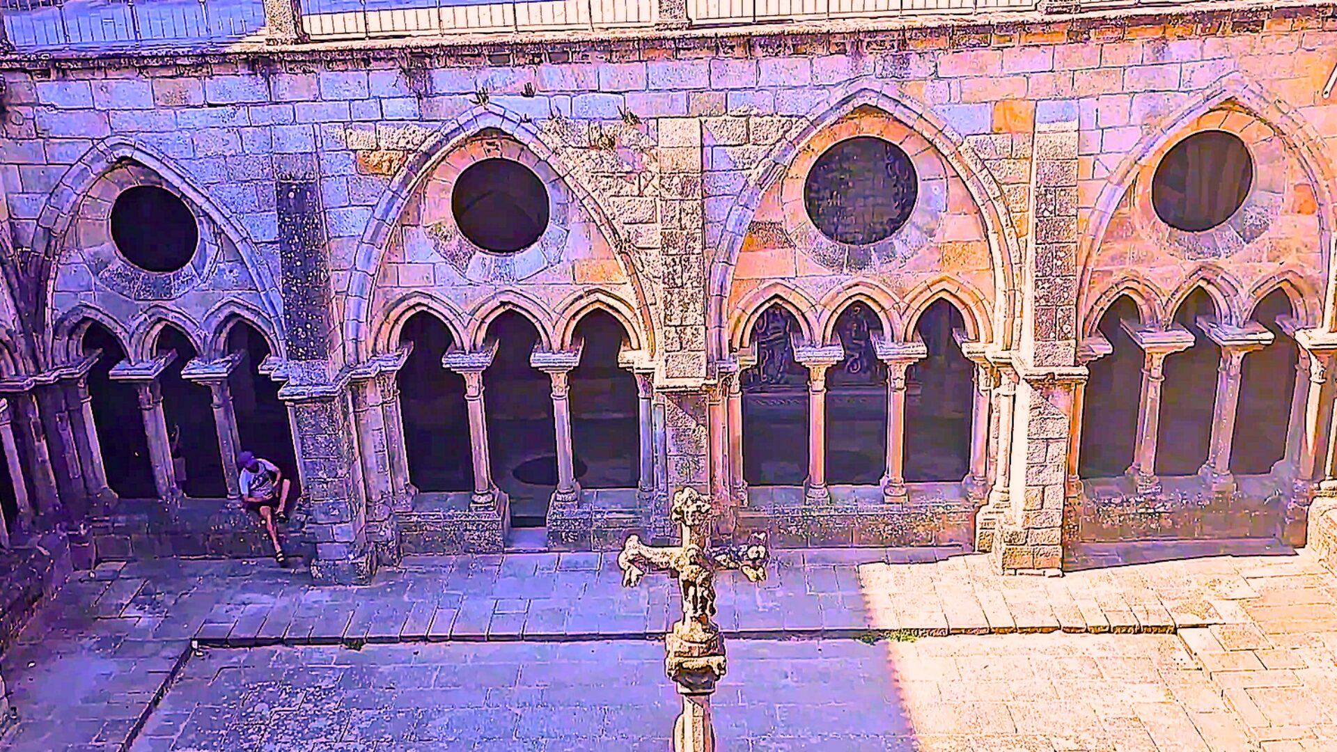Porto Cathedral cloister with arches and cross
