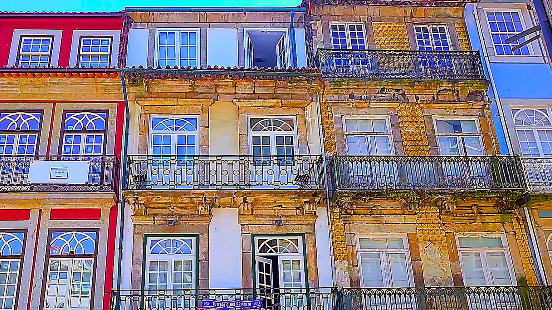 Colourful windows on old houses in Porto